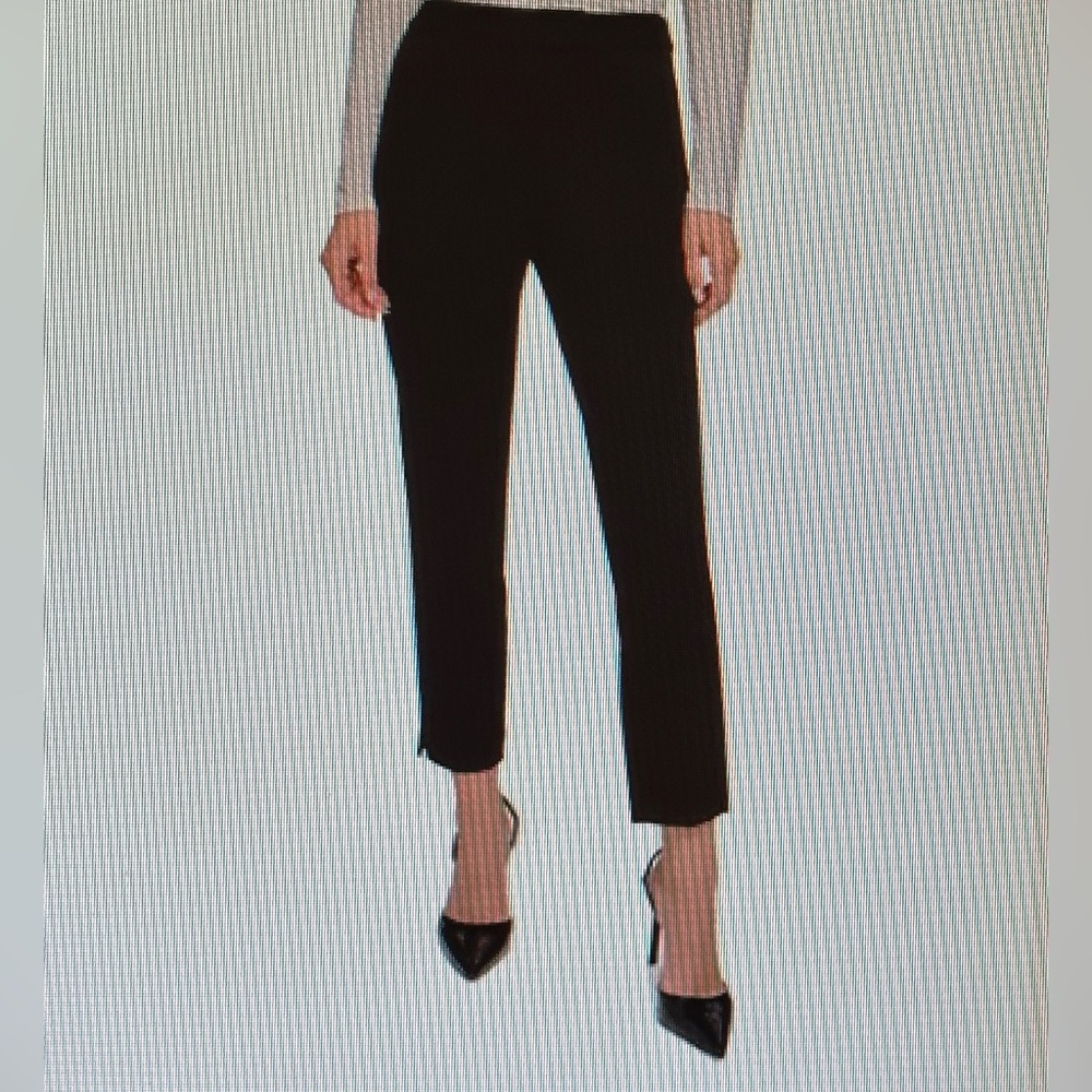 DKNY. Women slim- leg, mid- rise dress pants. Size 2.